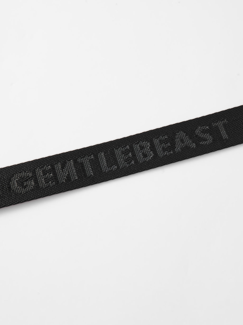Hands-free dog leash by GENTLEBEAST, featuring adjustable strap, ergonomic design, and a sleek black finish.