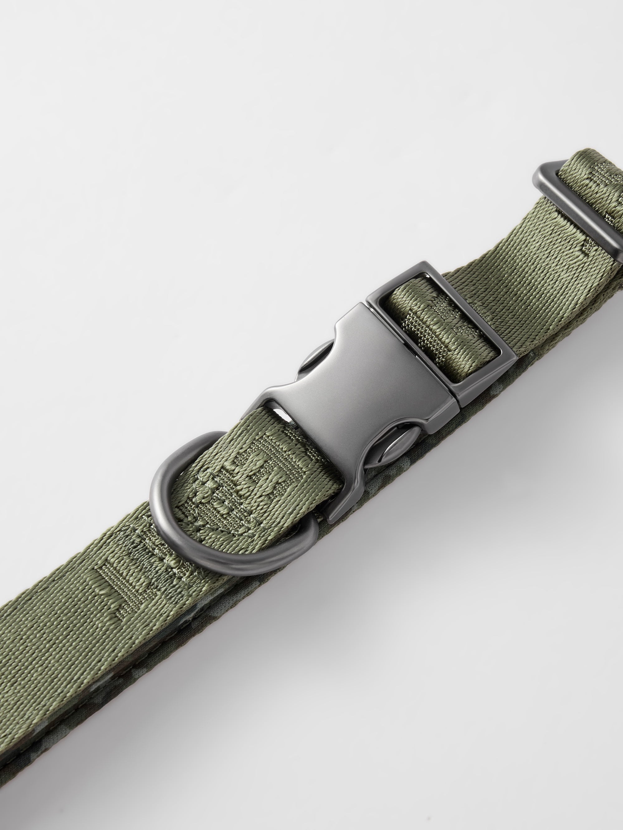 Hands-free dog leash by GENTLEBEAST shown on a person, featuring adjustable straps and a comfortable grip.