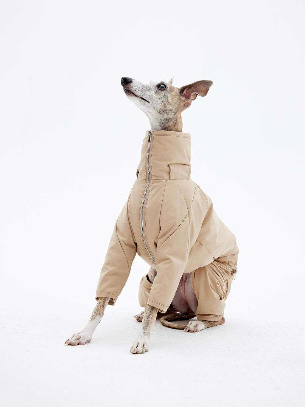 KNOWZA dog puffer suit in vibrant color, featuring a cozy quilted design for warmth and comfort during cold weather.