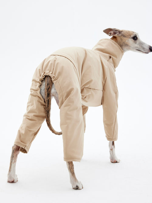 KNOWZA dog puffer suit in blue, showcasing a cozy and stylish design for winter outdoor adventures.