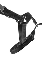Black GENTLEBEAST dog headcollar displayed on a white background, showing adjustable straps and a comfortable design.