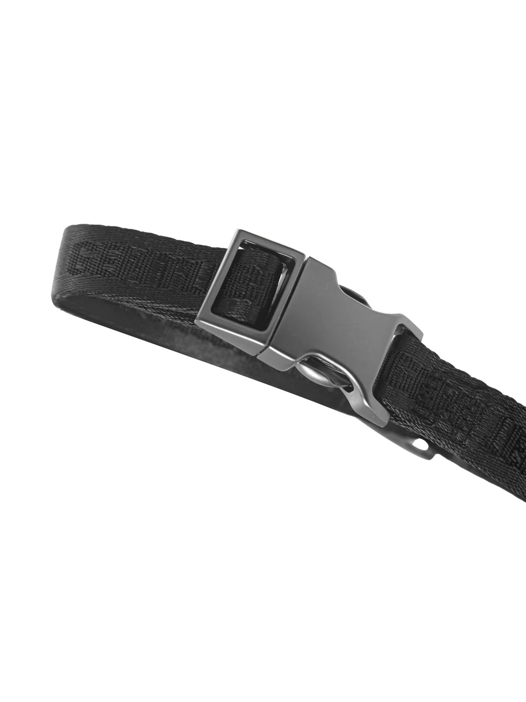 Black GENTLEBEAST dog headcollar displayed on a neutral background, showcasing its design and adjustable features.