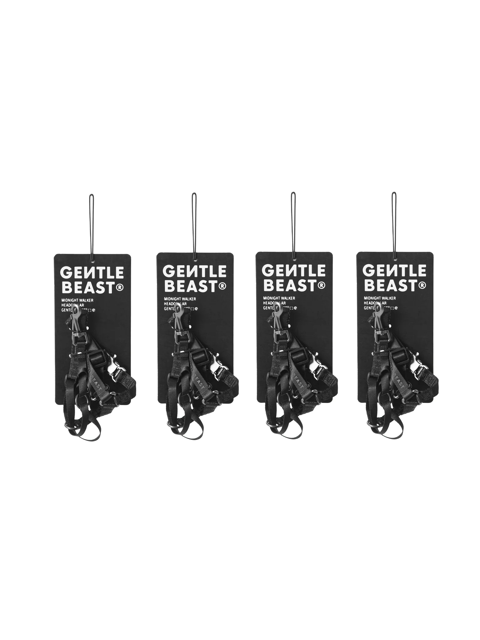 Black dog headcollar by GENTLEBEAST, featuring adjustable straps and a secure fit for comfortable control.