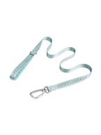 Mint blue GENTLEBEAST dog leash displayed on a wooden surface with a stylish design and sturdy clip attachment.