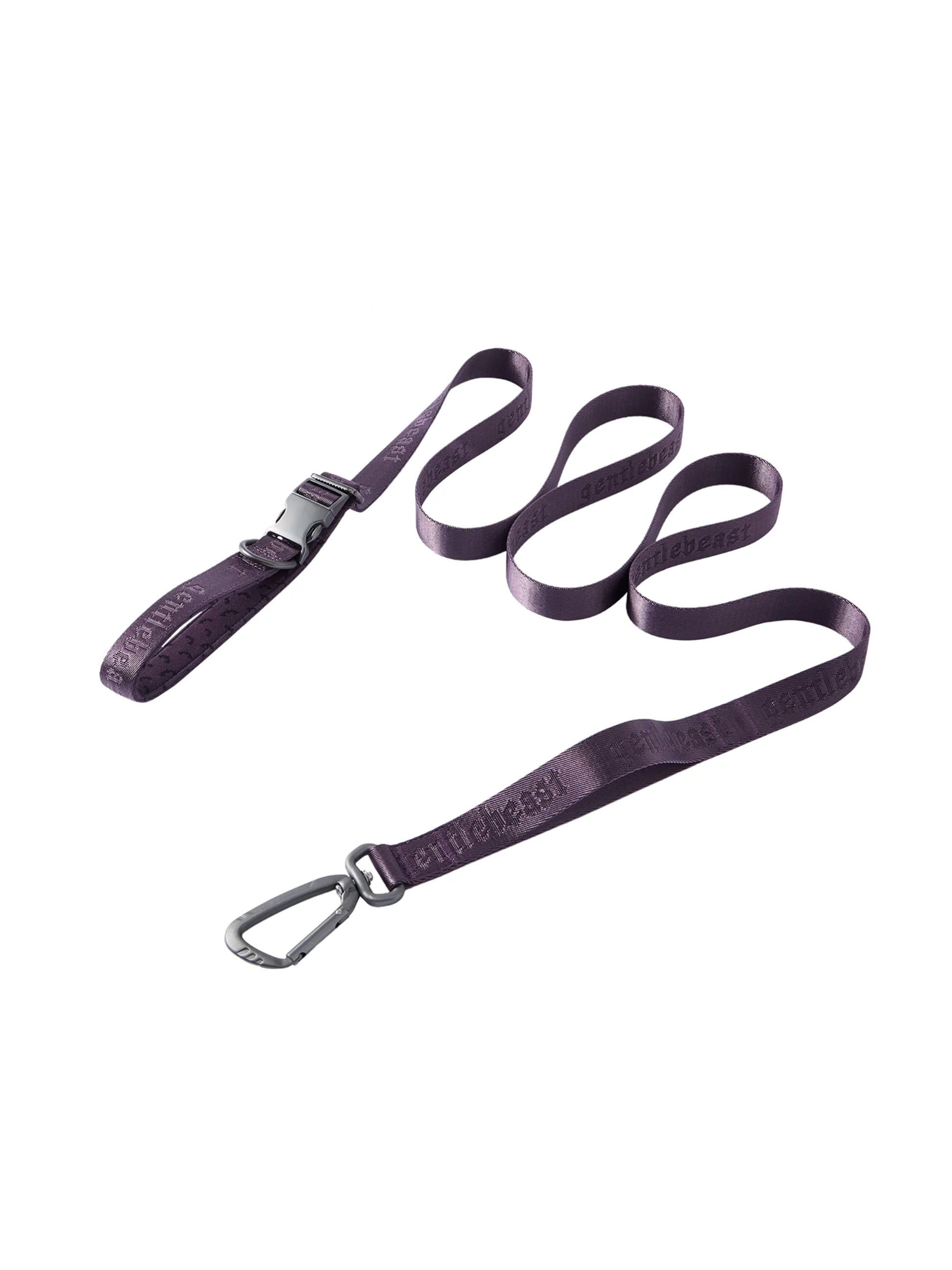 Purple GENTLEBEAST dog leash displayed on a wooden surface with a clip and handle visible.
