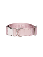 GENTLEBEAST pink dog collar displayed on a soft surface, showcasing its adjustable buckle and stylish design.