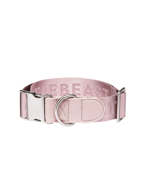 GENTLEBEAST pink dog collar displayed on a soft surface, showcasing its adjustable buckle and stylish design.