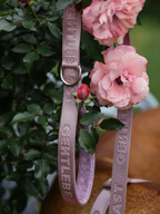 Pink GENTLEBEAST dog leash with a sturdy clasp and comfortable grip, displayed against a neutral background.