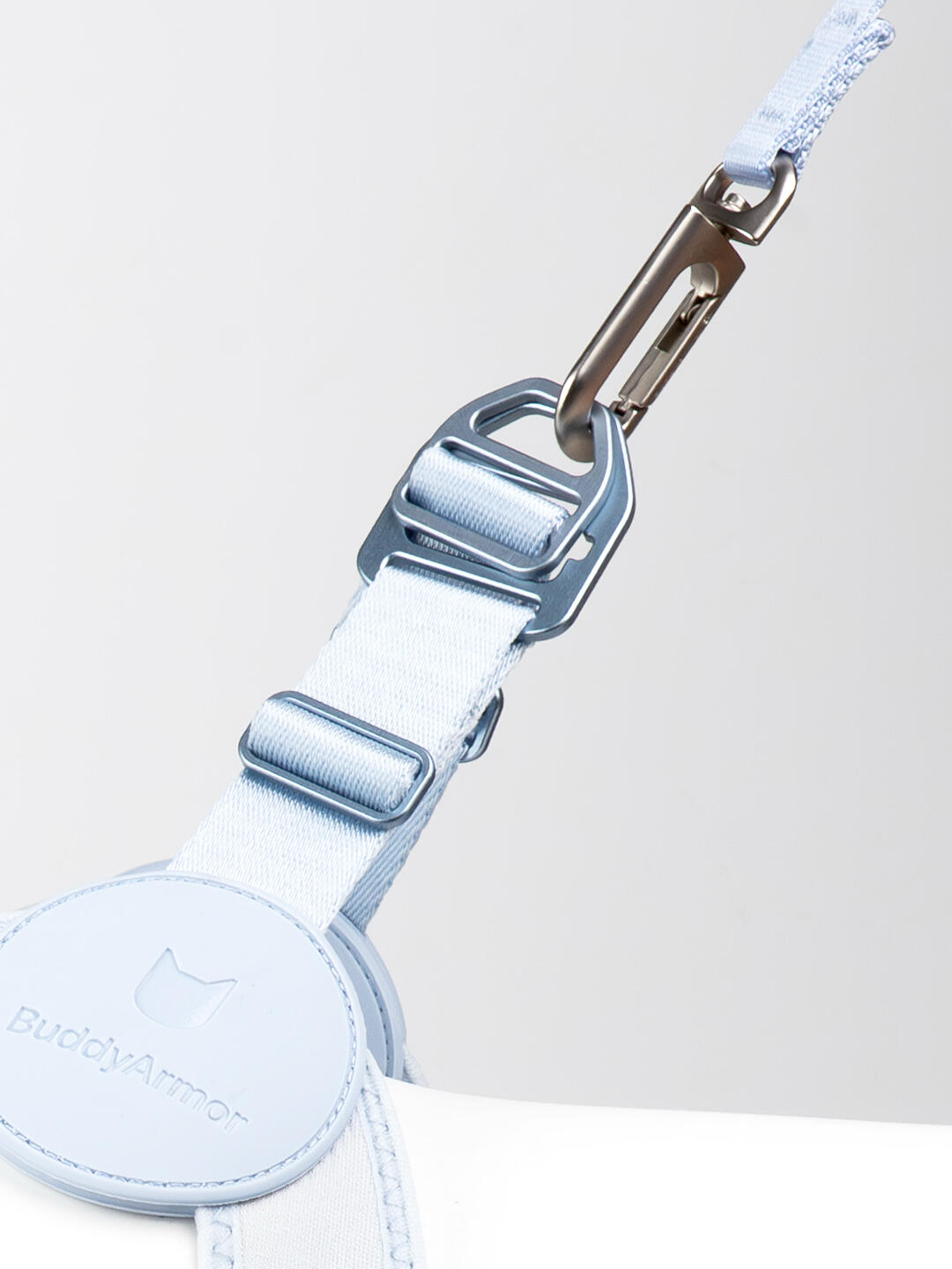 Light blue strap with carabiner on a white background