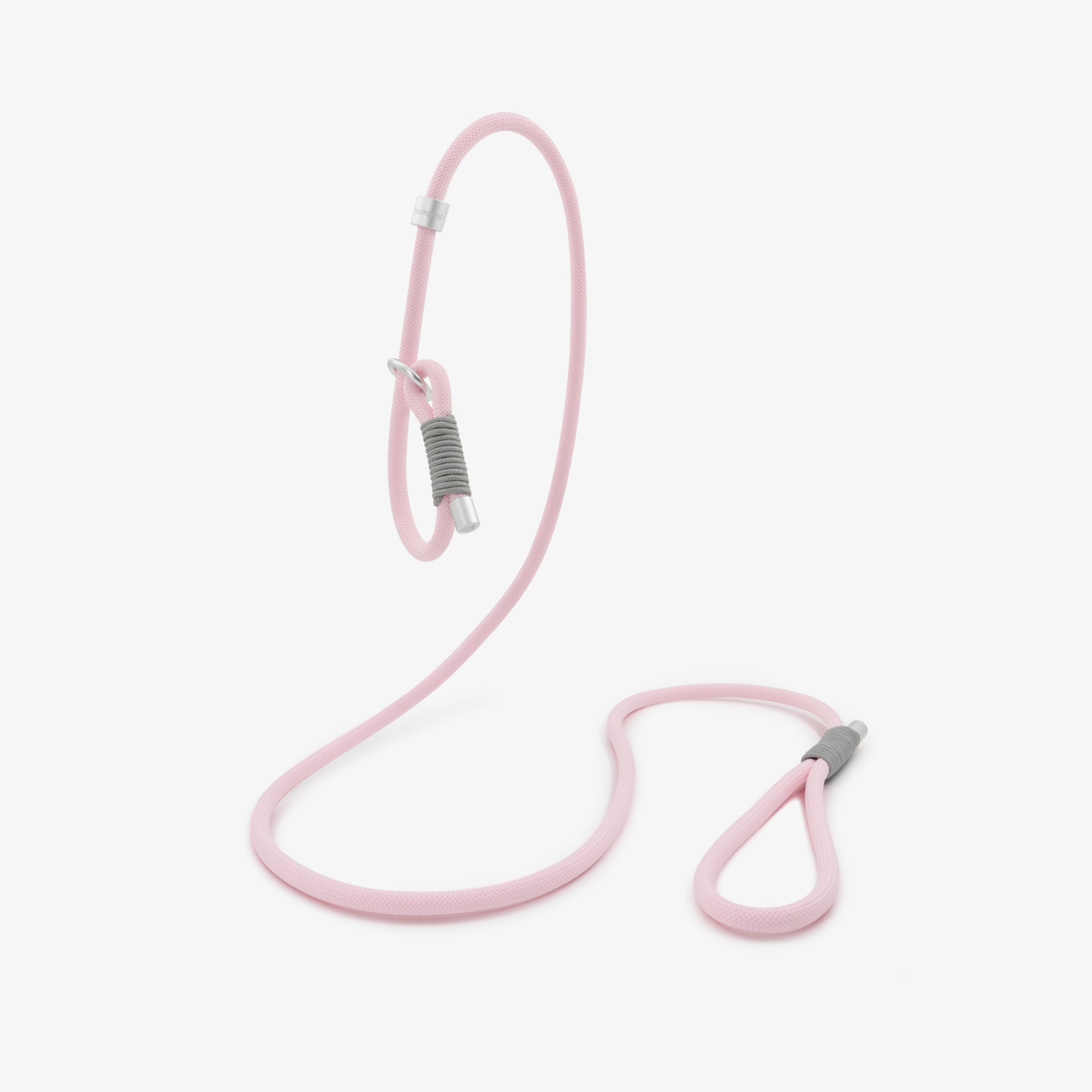 Pink braided rope dog leash with adjustable loop and metal ring, featuring a soft color palette and minimalist design.