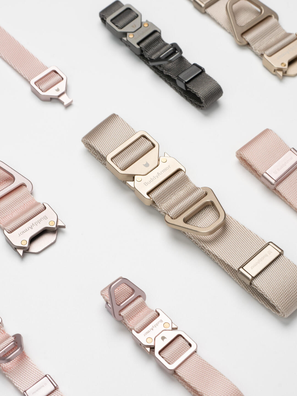 Set of dog collars in various colors on a light background