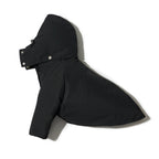 Flat lay of a black dog down jacket showing the detachable hood and overall shape