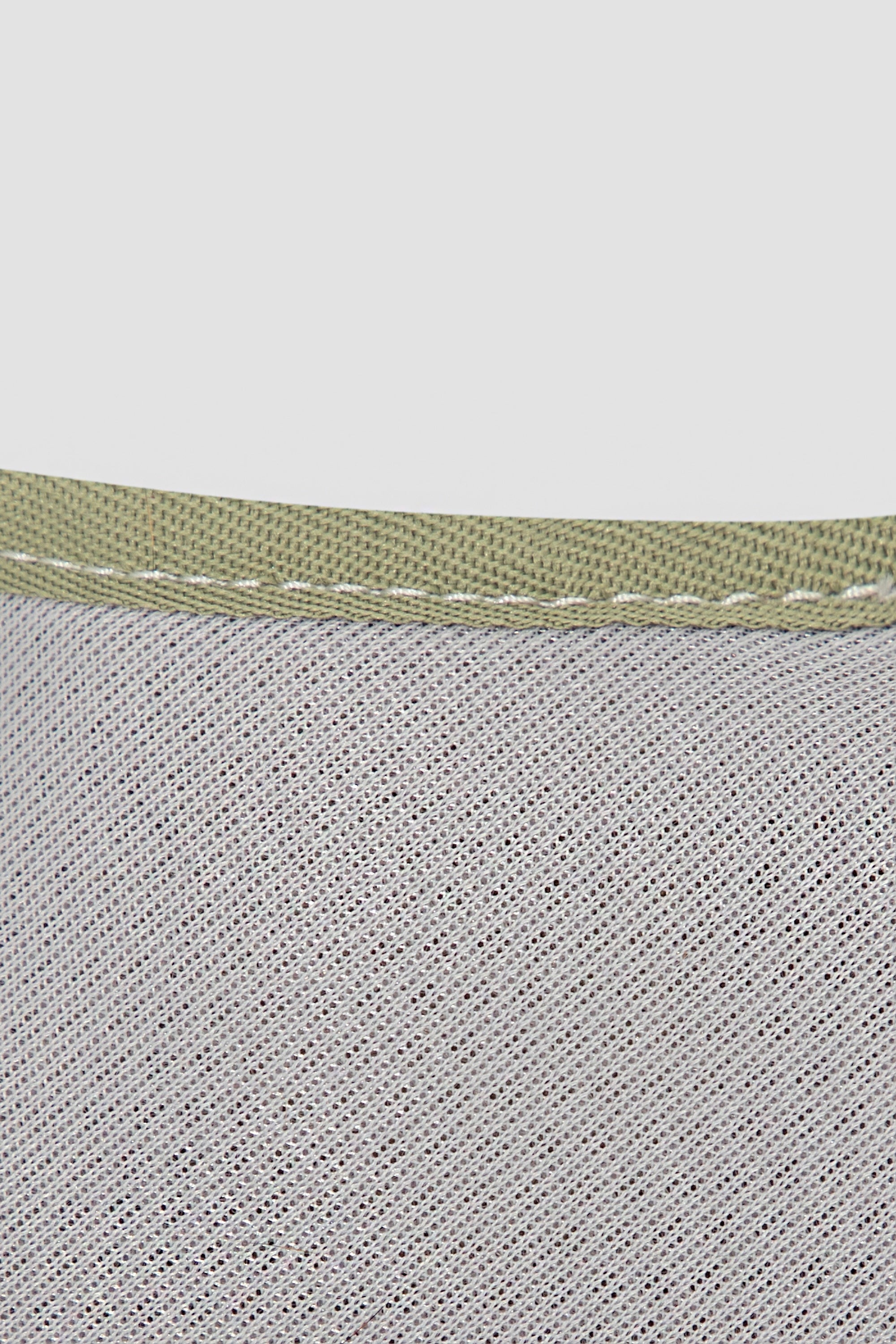 Close-up of breathable mesh fabric used on the cat harness, showing lightweight woven texture designed for airflow and everyday comfort.