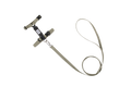Flat lay of cat harness and leash set in dark color, showing H-style structure, adjustable straps, and integrated leash connection.