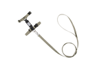 Flat lay of cat harness and leash set in dark color, showing H-style structure, adjustable straps, and integrated leash connection.