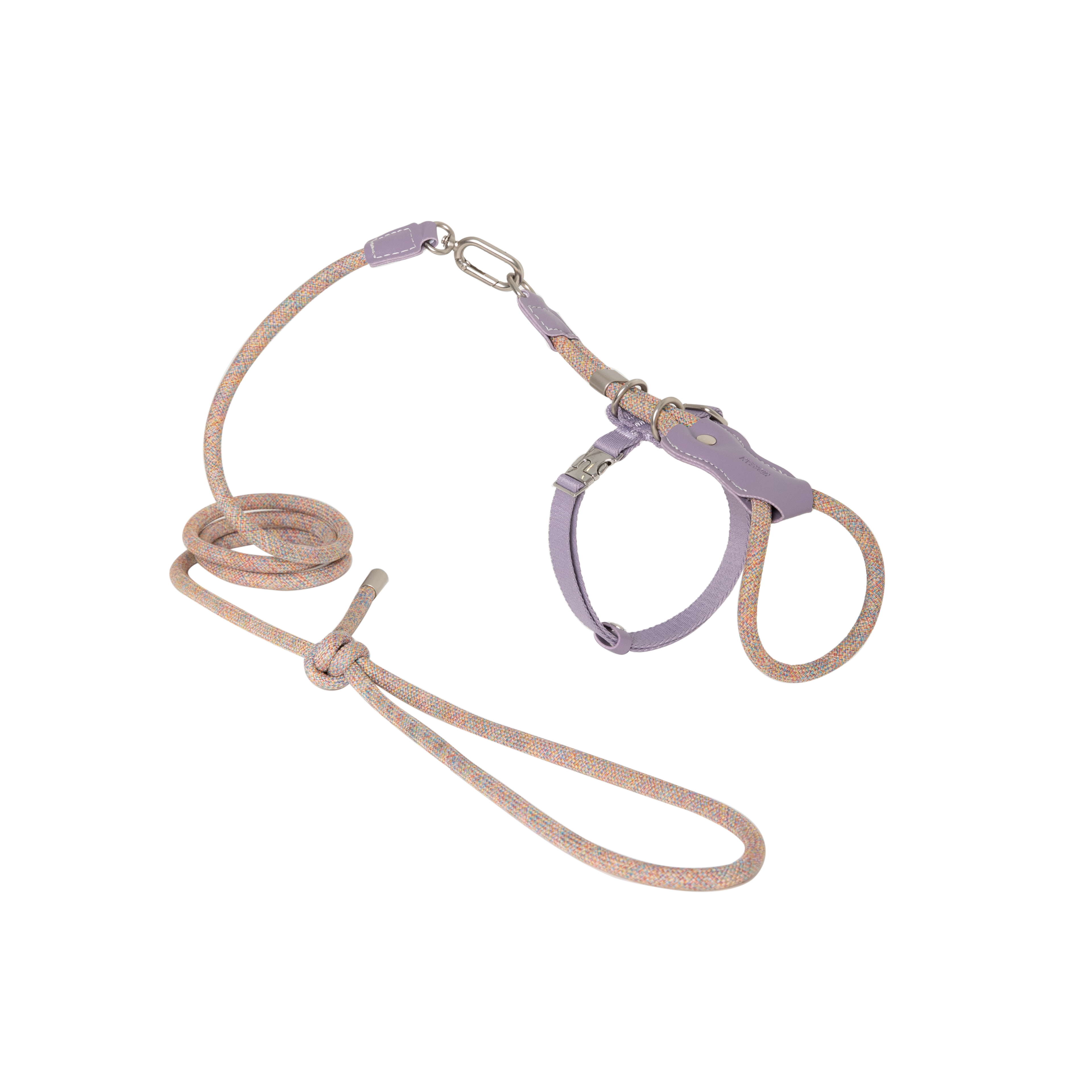Flat lay of a purple cat harness and leash set, showing the full configuration including rope leash, harness, and metal hardware.
