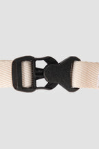 Close-up of POM quick-release buckle on cat harness, showing secure locking structure and smooth snap-on design for easy wearing.