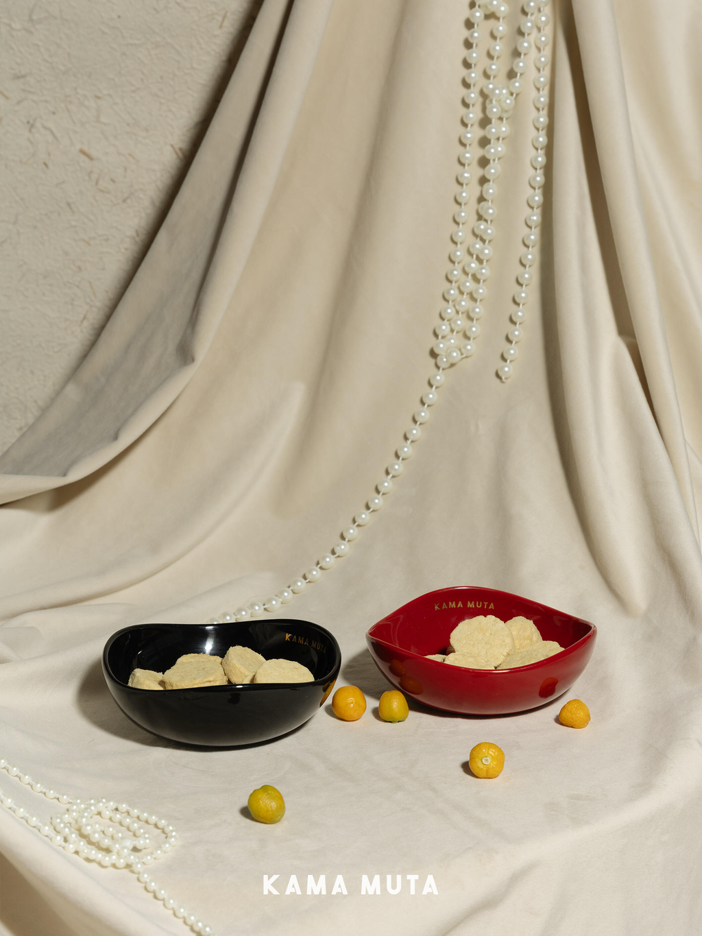 Ceramic dog and cat bowls holding dry food, designed for daily feeding with a stable flat base and curved interior.