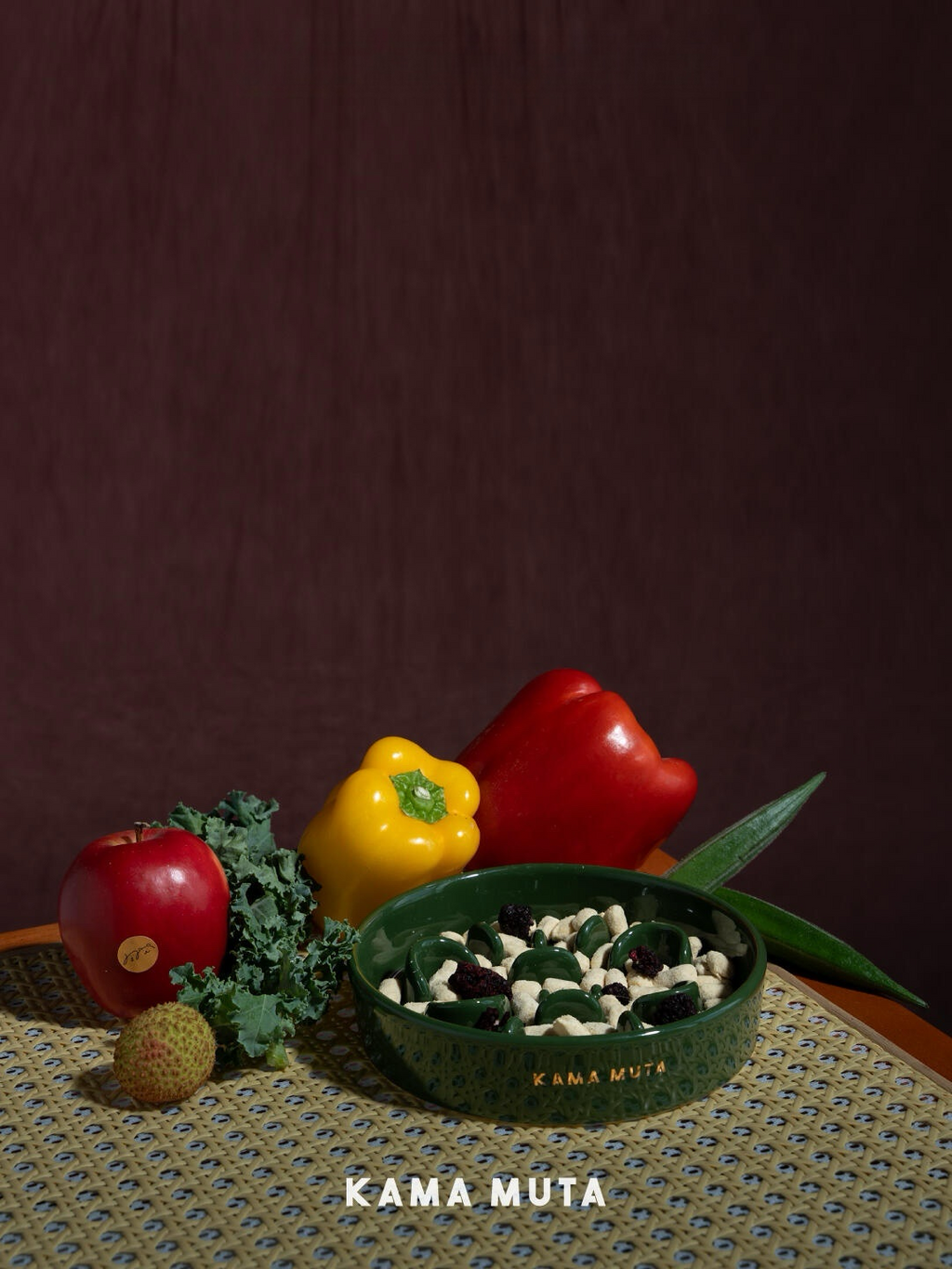 Green ceramic slow feeder bowl filled with mixed food, showcasing the bowl’s internal slow-feeding structure.