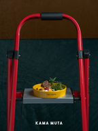 Yellow ceramic slow feeder bowl displayed on a raised surface, highlighting its durable underglaze ceramic finish.