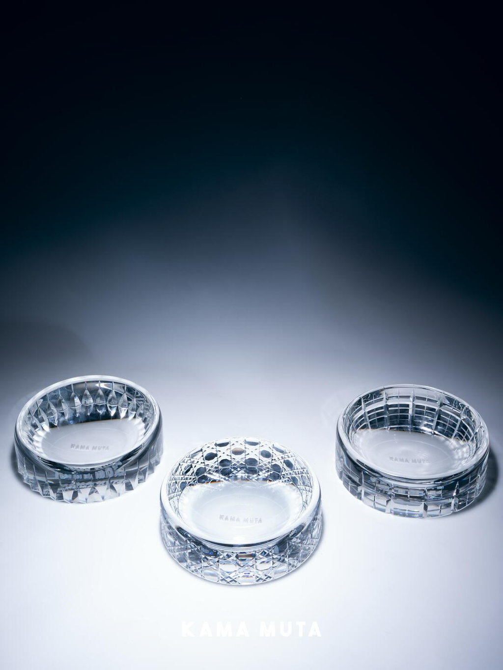 Three crystal pet bowls displayed together, showcasing consistent form and refined crystal design