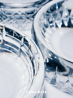 Close-up of cut crystal bowl surfaces, emphasizing layered crystal craftsmanship