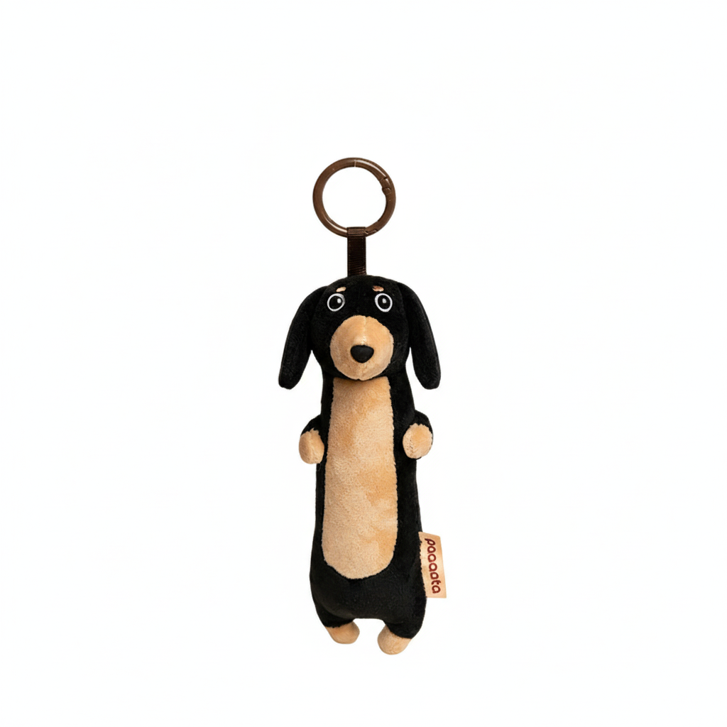 Black short-haired Dachshund plush keychain by paaaata with detailed stitching and adorable dog design.