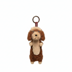 Brown long-haired Dachshund plush keychain from paaaata with detailed dog design and attached keyring.
