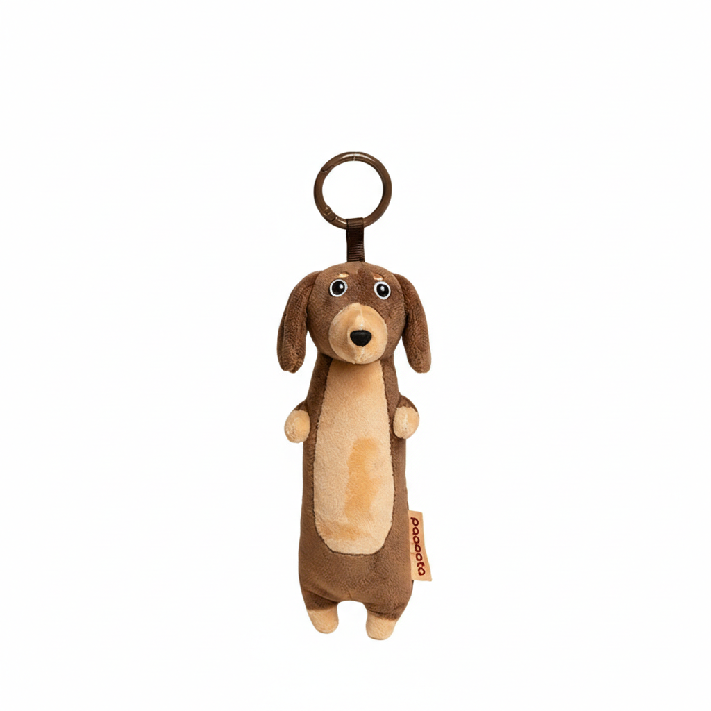 Soft plush Dachshund keychain by paaaata with chocolate brown short-haired design, perfect for attaching to keys or bags.