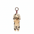 Soft plush Dachshund keychain by paaaata featuring a long-haired, dappled white design with detailed stitching and a keyring attachment.