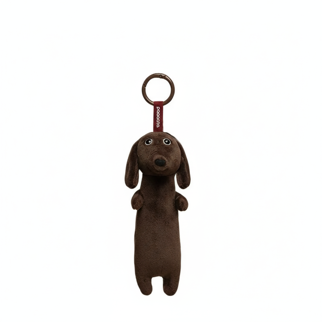 Soft plush dachshund keychain by paaaata featuring a cute, short-haired dog design with a keyring attachment.