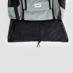 Bottom mesh panel of a dog front carrier bag shown fully opened, increasing ventilation and interior space.