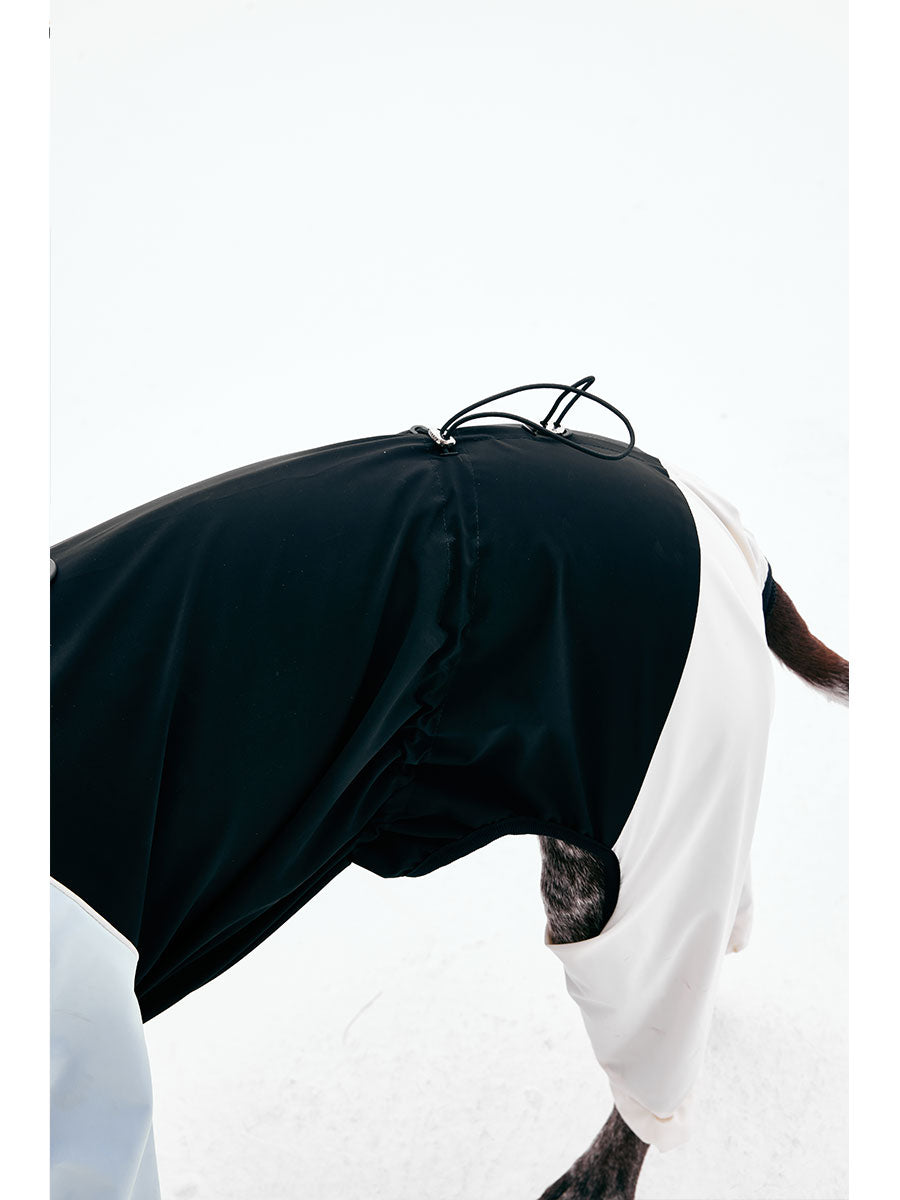 Adjustable back waist detail on a dog raincoat for a secure and flexible fit