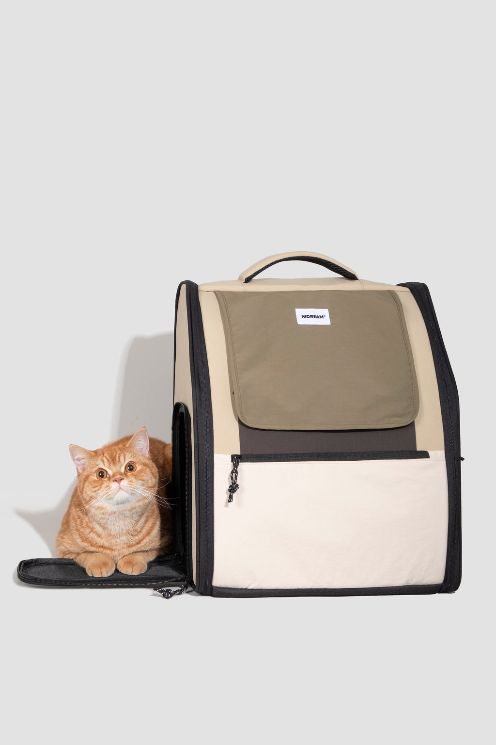  Expandable pet carrier backpack with a large side entry door opened, showing a cat at the opening and the easy in-and-out access design.