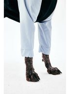 Four-leg dog raincoat shown at leg level to demonstrate fit and movement allowance