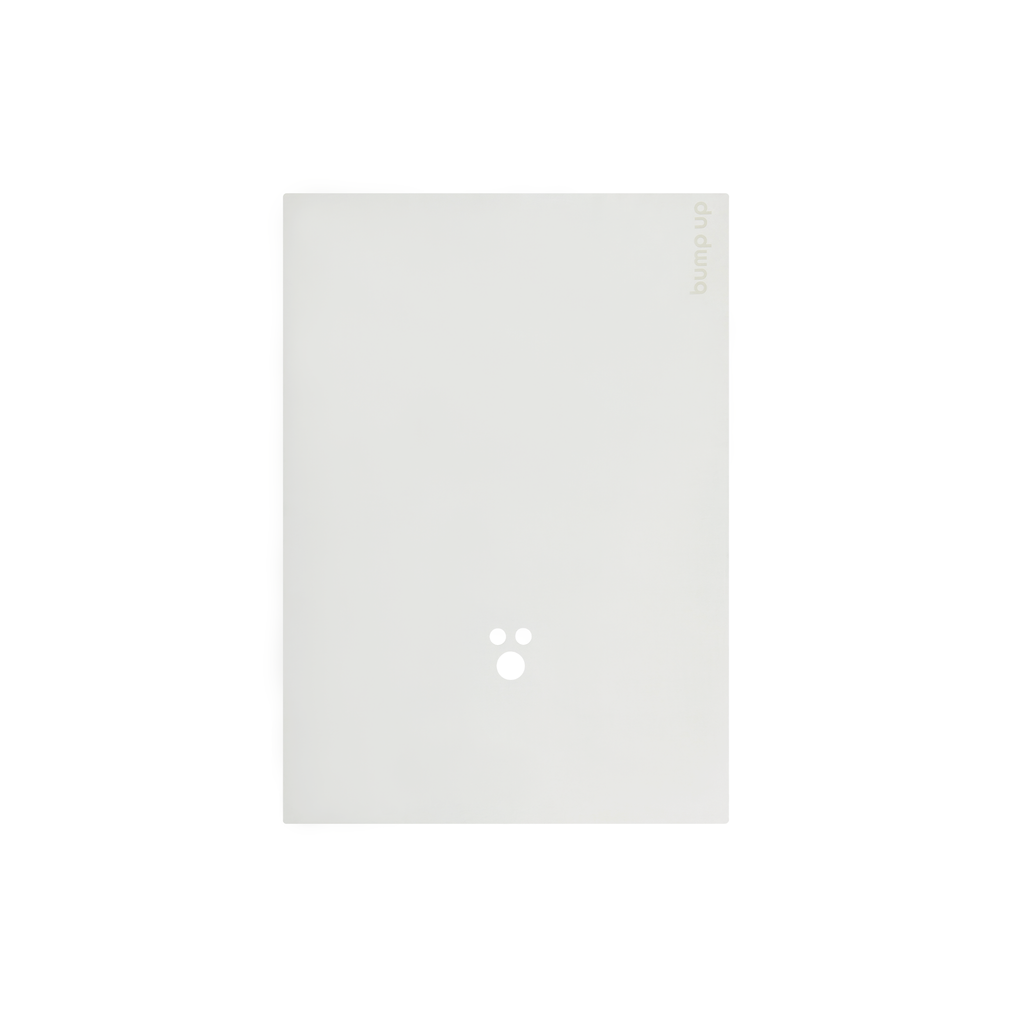 Flat lay of ghost-style dog towel with subtle logo detail and minimal rectangular shape