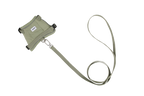 Flat lay of a green cat harness and matching green leash on a white background, showing the metal connection clip between the harness and leash.