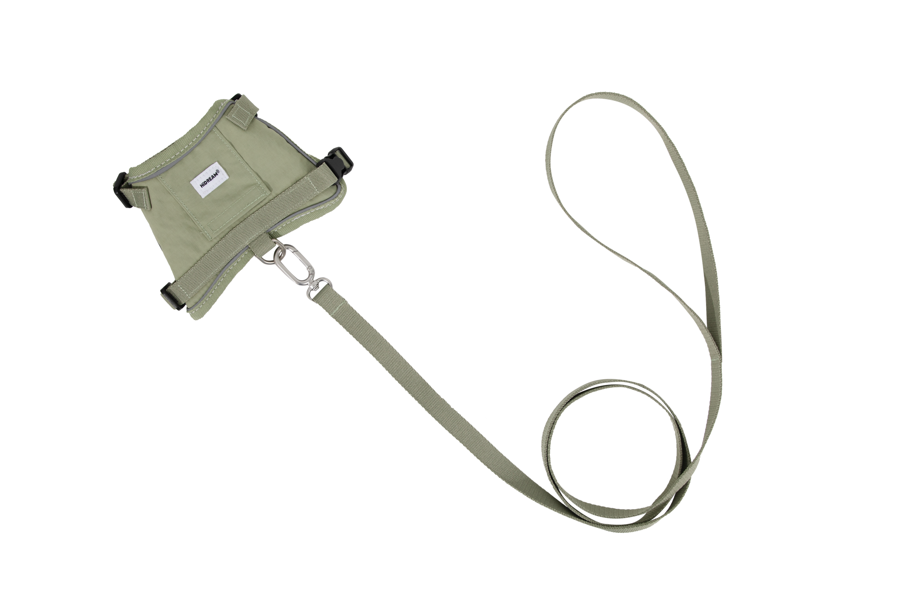 Flat lay of a green cat harness and matching green leash on a white background, showing the metal connection clip between the harness and leash.