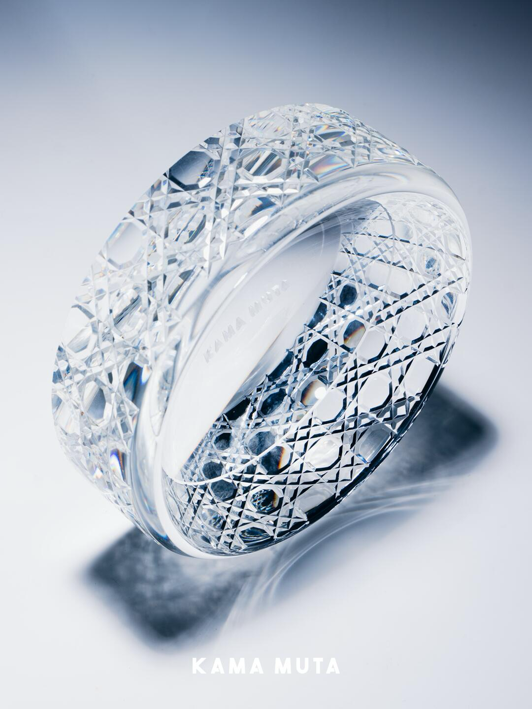 Side view of a hand cut crystal bowl showing detailed geometric cutting patterns