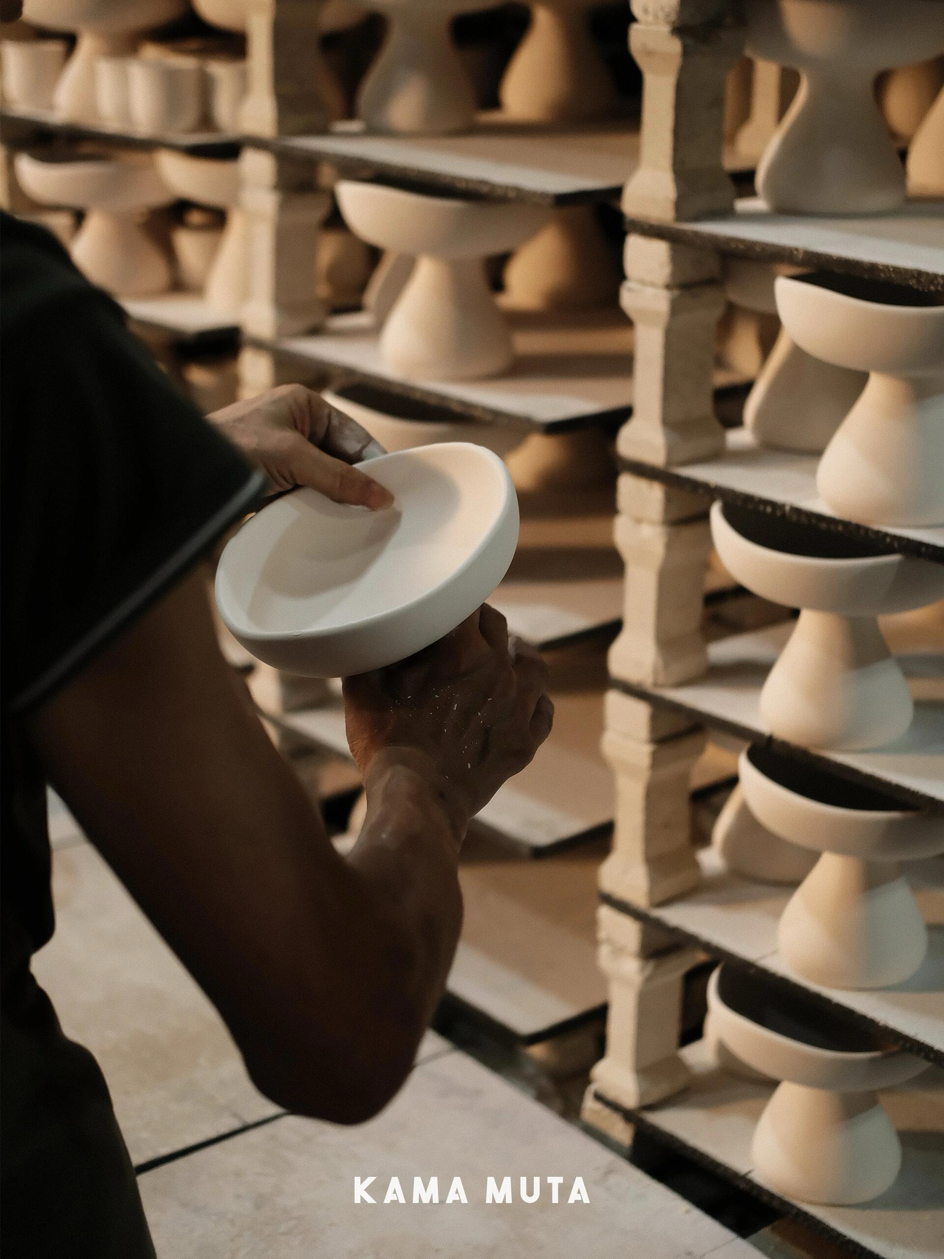Handcrafted ceramic cat bowls in production, showing the making process of mushroom-shape elevated ceramic cat bowls.