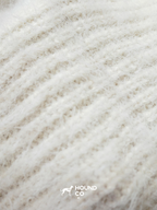 Hound Co.'s collection of fuzzy knit snoods in mustard yellow, cobalt blue, and ivory, displayed to showcase color options for sighthound owners.