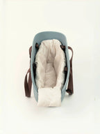 KAMA MUTA pet tote carrier bag, ultra-lightweight and waterproof, shown with a small pet inside for comfortable travel.
