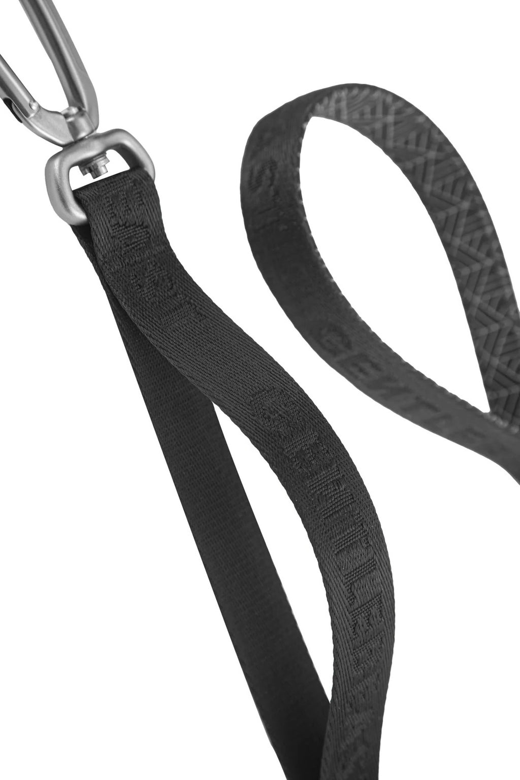 Black GENTLEBEAST dog leash displayed on a wooden surface with a metal clip and soft grip handle.