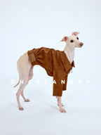 Italian Greyhound standing in profile on a white studio background wearing a brown suede-like ONCELANDAY dog jacket, featuring a structured high collar and zip closure.