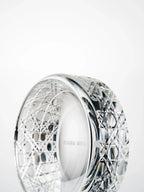 Side view of a hand-cut K9 crystal bowl highlighting geometric cutting patterns and smooth inner rim