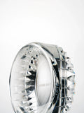 Precision-cut crystal edges forming a rhythmic pattern around the exterior of the crystal bowl