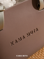 Textured EVA material on small dog tote carrier provides lightweight structure and easy daily cleaning.