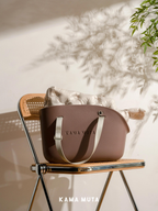 Small dog tote carrier with removable soft inner cushion, designed for comfortable daily travel and short trips.