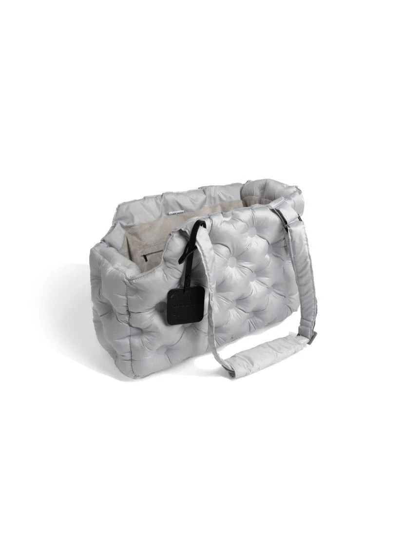 Light gray padded dog carrier bag with a semi-enclosed design, offering a warm and comfortable space for small dogs during travel.