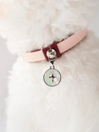 Luxury dog collar with a mother-of-pearl charm worn on a small dog, viewed from the back